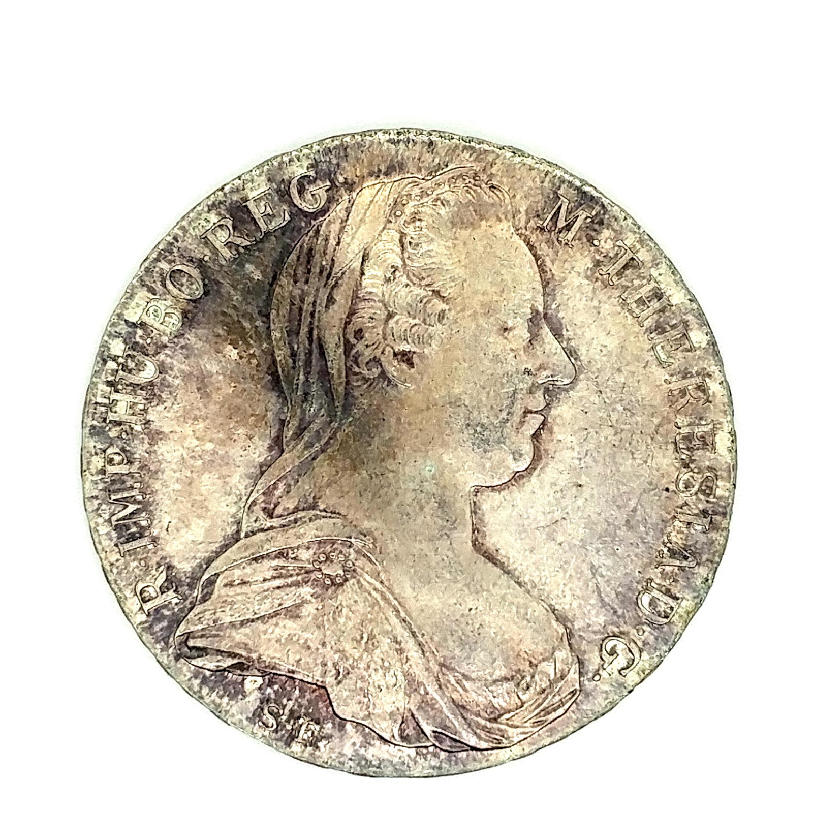 1780 RS Maria Theresa Thaler Original Holder: A 1780 RS Maria Theresa Thaler in Volks-bank Original Holder. Completely original with wonderful blue-russet toning a tough find with the original holder.