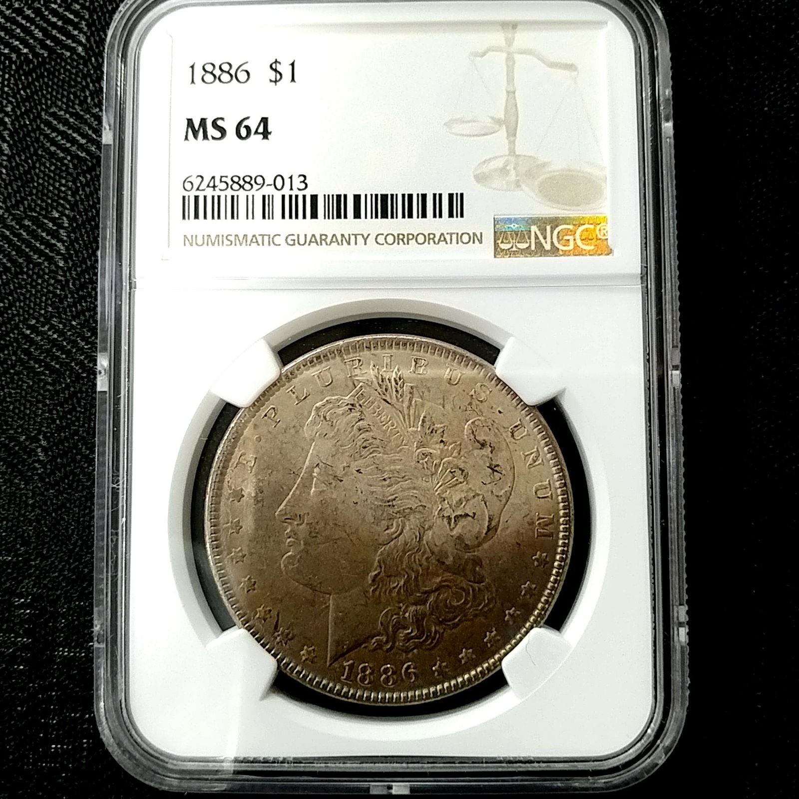 1886 Morgan Silver Dollar NGC MS64 Toned (1 of 4)