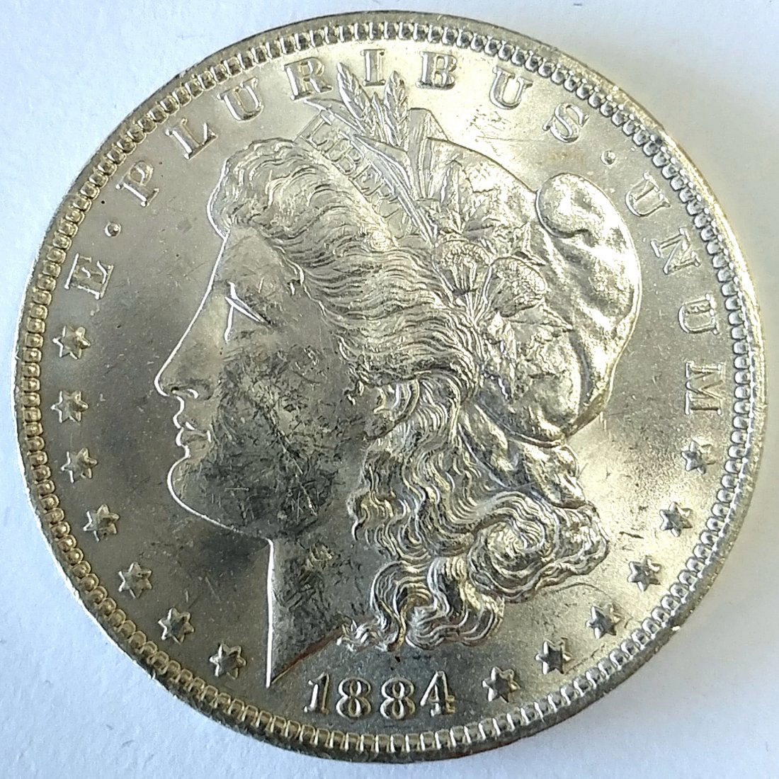 1884 O Morgan Silver Dollar Ch. BU (1 of 2)