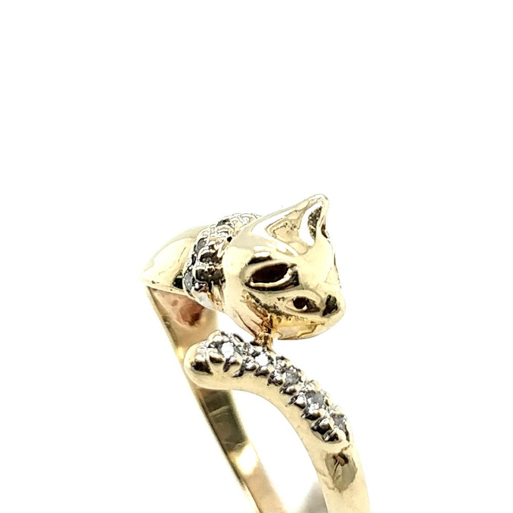 10K Yellow Gold Diamond Cat Bypass Ring: This is a 10 karat yellow gold bypass cat ring. The cat is wearing a diamond collar and has a diamond tail! There is approximately .05 carats of round, faceted diamonds in this ring. 