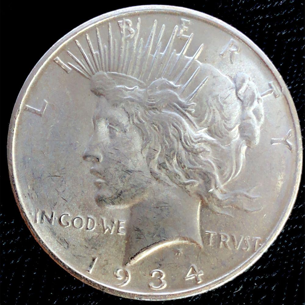 1934 D Peace Silver Dollar Choice Unc. (1 of 2)