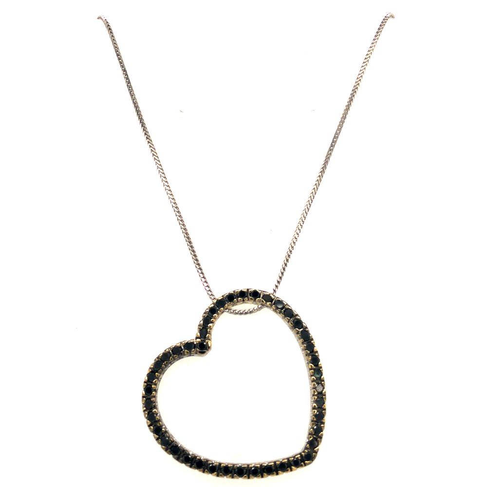 1 CTW Black & White Dia Reverse Heart Pendant 14K: This is a 14 karat white gold black and white diamond reversible heart pendant. There is approximately 1 carat of round, brilliant-cut black and white diamonds in this pendant. The heart i