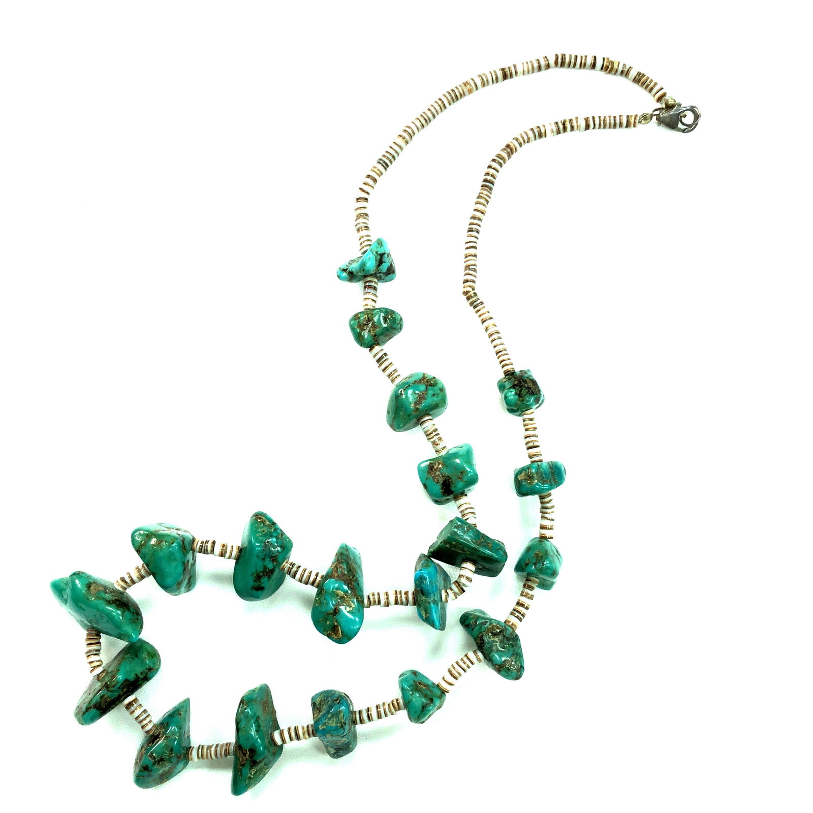 Vintage Navajo Royston Turquoise Nugget Necklace: Navajo AAA Royston Turquoise & heishi nugget necklace 19mstone with gold matrix graduated 408 ct from small stone L 1/2 "x W 3/8" largest L 1" x W 1/2" sterling silver clasp OAL 24"