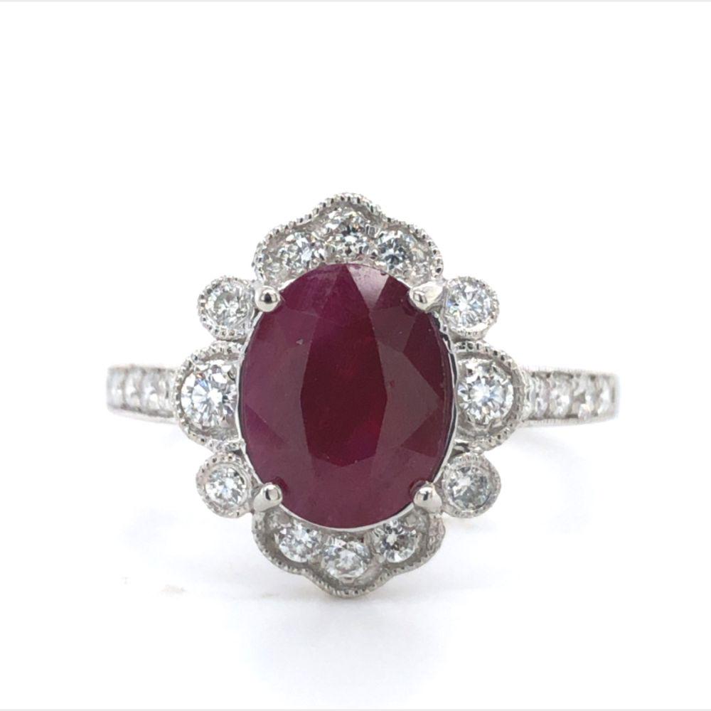GIA Burma Ruby and Diamond Ring Platinum: This is a certified and appraised genuine ruby and natural diamond ring, set in platinum. The GIA graded 2.24 carat RARE Burmese ruby is prong-set in a platinum ring with .37 carats of round, br