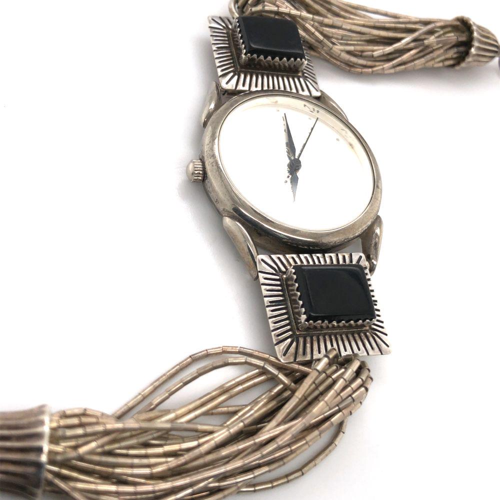 Circa 1960's Navajo Liquid Silver Onyx Watch Band: Circa 1960's Navajo Liquid Silver AAA Black Onyx this vintage handmade Watch Band measures L 8" W 7/8 " with working liberty 1811 W 1 1/4 " sterling silver sign