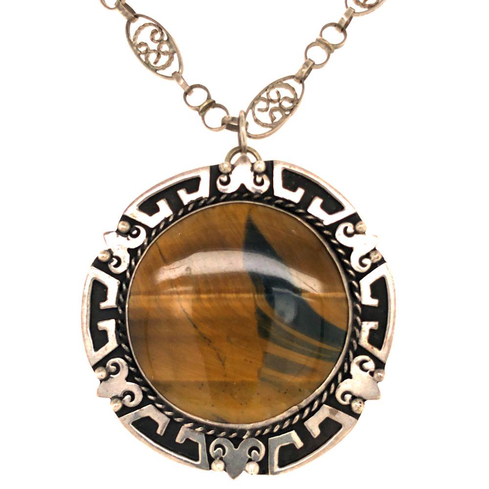 Mexico 925 Hand Made Vintage Tiger Eye Pendant: Mexico 925 silver Hand Made Vintage Tiger Eye Pendant size 2 " round on handmade 925 silver chain 24" signed