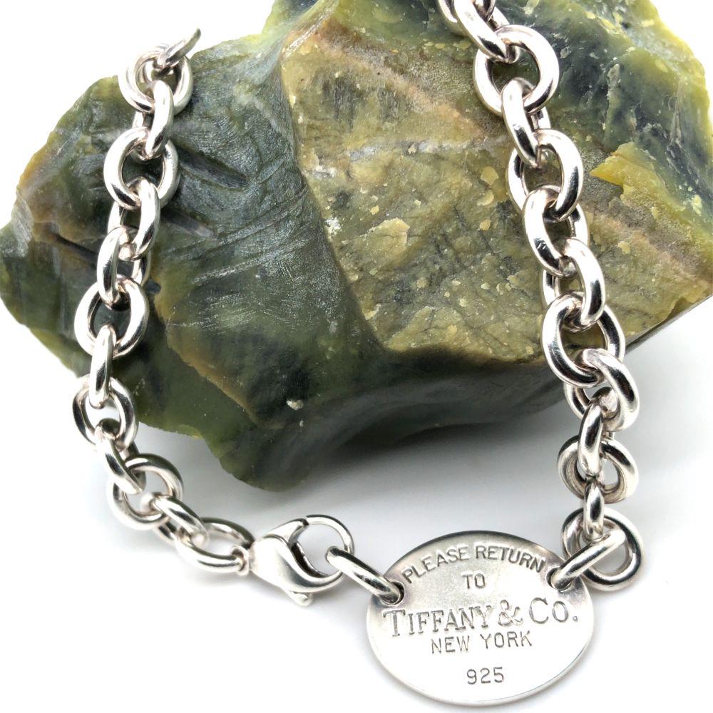 Please Return To TIffany Oval Tag Choker: This is a stamped "Tiffany & Co" sterling silver iconic choker necklace. The oval tag is approximately 1" x 3/4" and is attached to an approximate 16" sterling silve