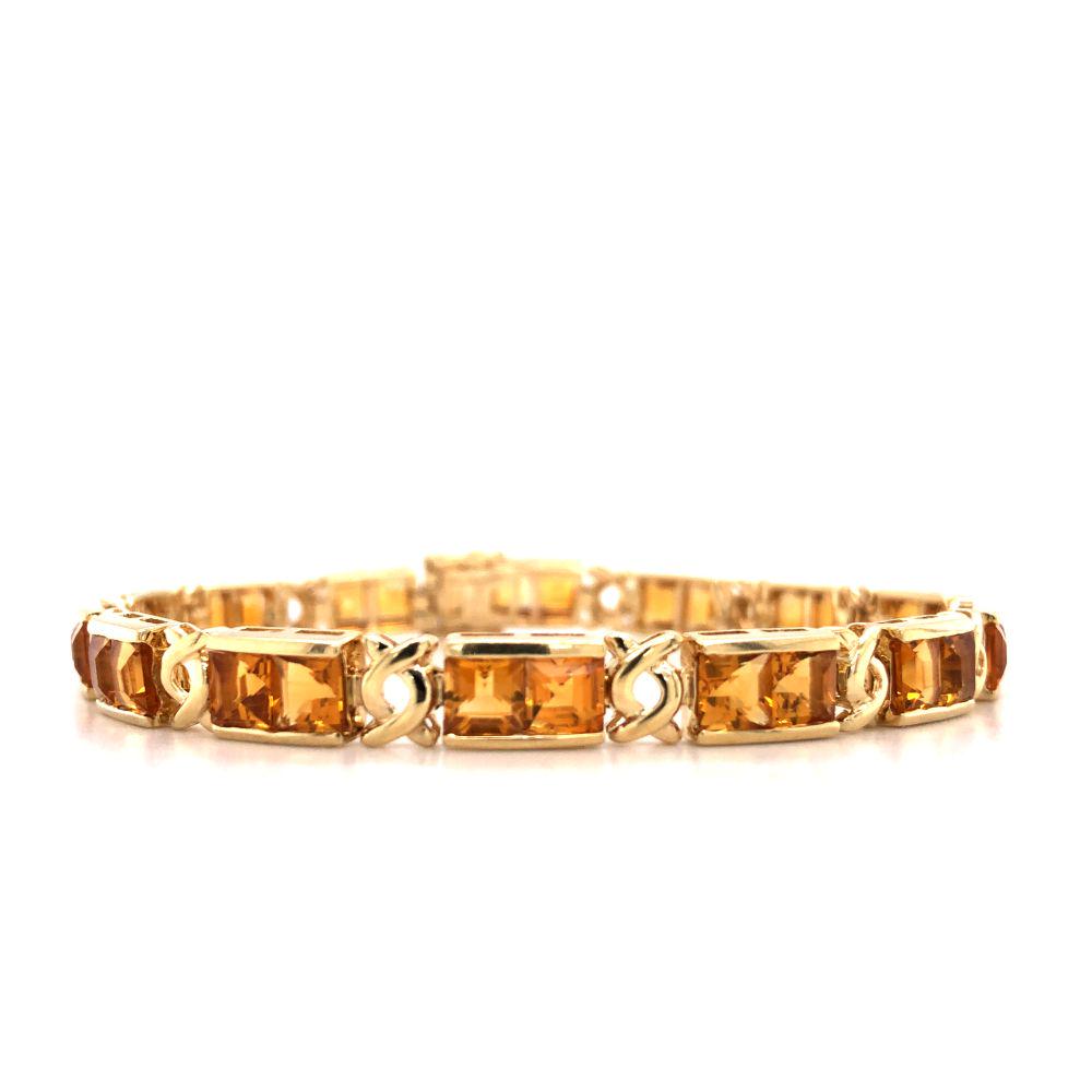 Citrine Eternity Bracelet: This bracelet features approximately 10.00 carats of princess-cut gem citrines that are as bright as a summer setting sun! They are channel set in 14 individual stations and the bracelet measure