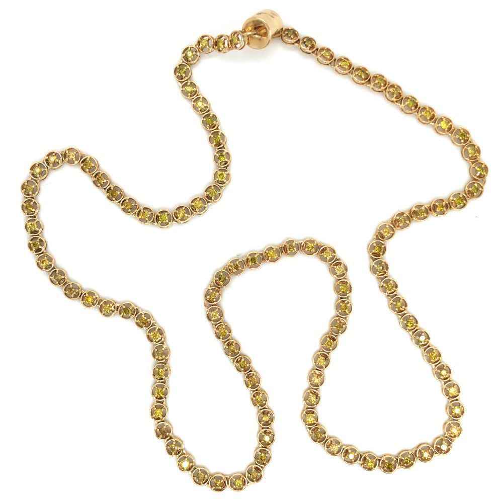 Yellow Diamond Eternity / Tennis Necklace: Yellow Diamond Tennis / Eternity Necklace. There is 2.39 carats of round, brilliant-cut, bright yellow diamonds in this 14 karat yellow gold necklace. The diamonds are prong-set inside circle frames. 