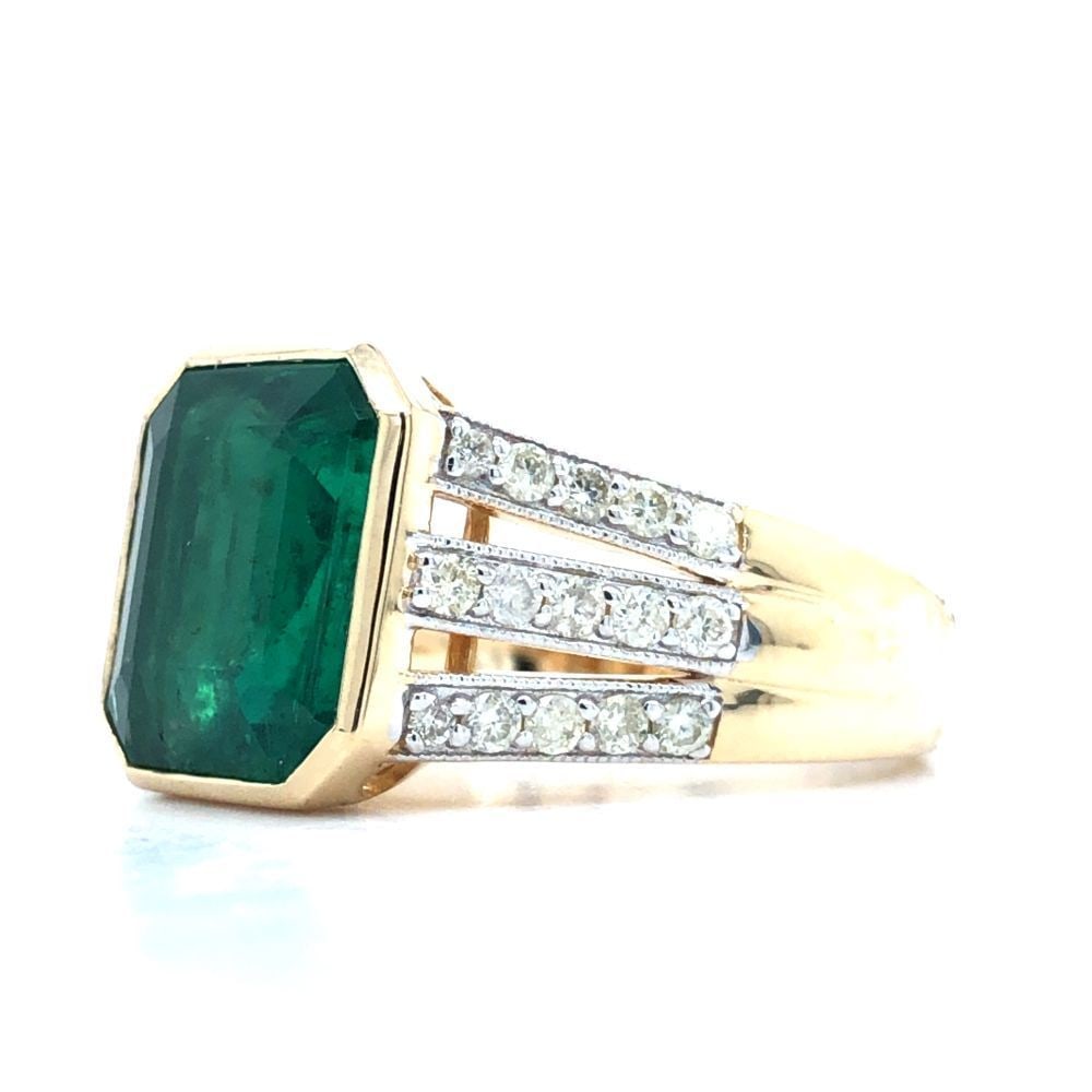 Bezel-Set Emerald-Cut Emerald and Diamond Ring: TITLE DESCRIPTION: Bezel-Set Emerald-Cut Emerald and Diamond Ring DESCRIPTION DETAIL: Genuine Emerald and Earth-Mined Diamond Ring OVERALL CONDITION: Excellent, New STO