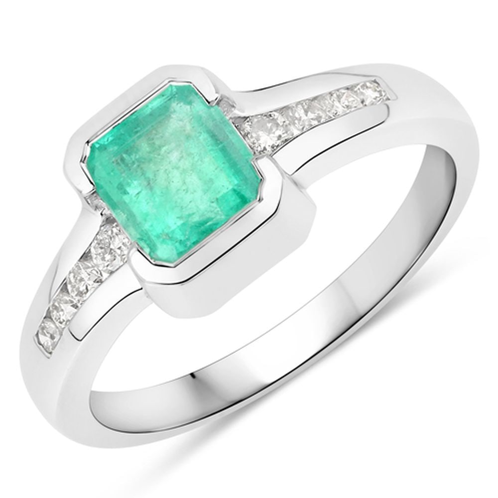 Modern Colombian Emerald Bezel Diamond Ring: S/3.1-TAL This timeless ring is crafted in polished 14k white gold. The centerpiece of this design is a beautiful octagon-cut natural emerald, weighing approximately 0.98 carats. Accenting the e