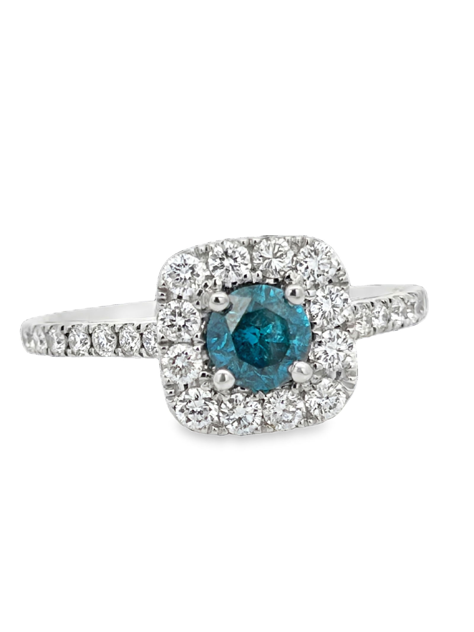Blue & White Diamond Ring: MCE1003/26-MOYS This elegant ring showcases a striking round brilliant-cut blue diamond at the center, displaying rich, ocean-blue tones with captivating depth and sparkle. The center stone is secure