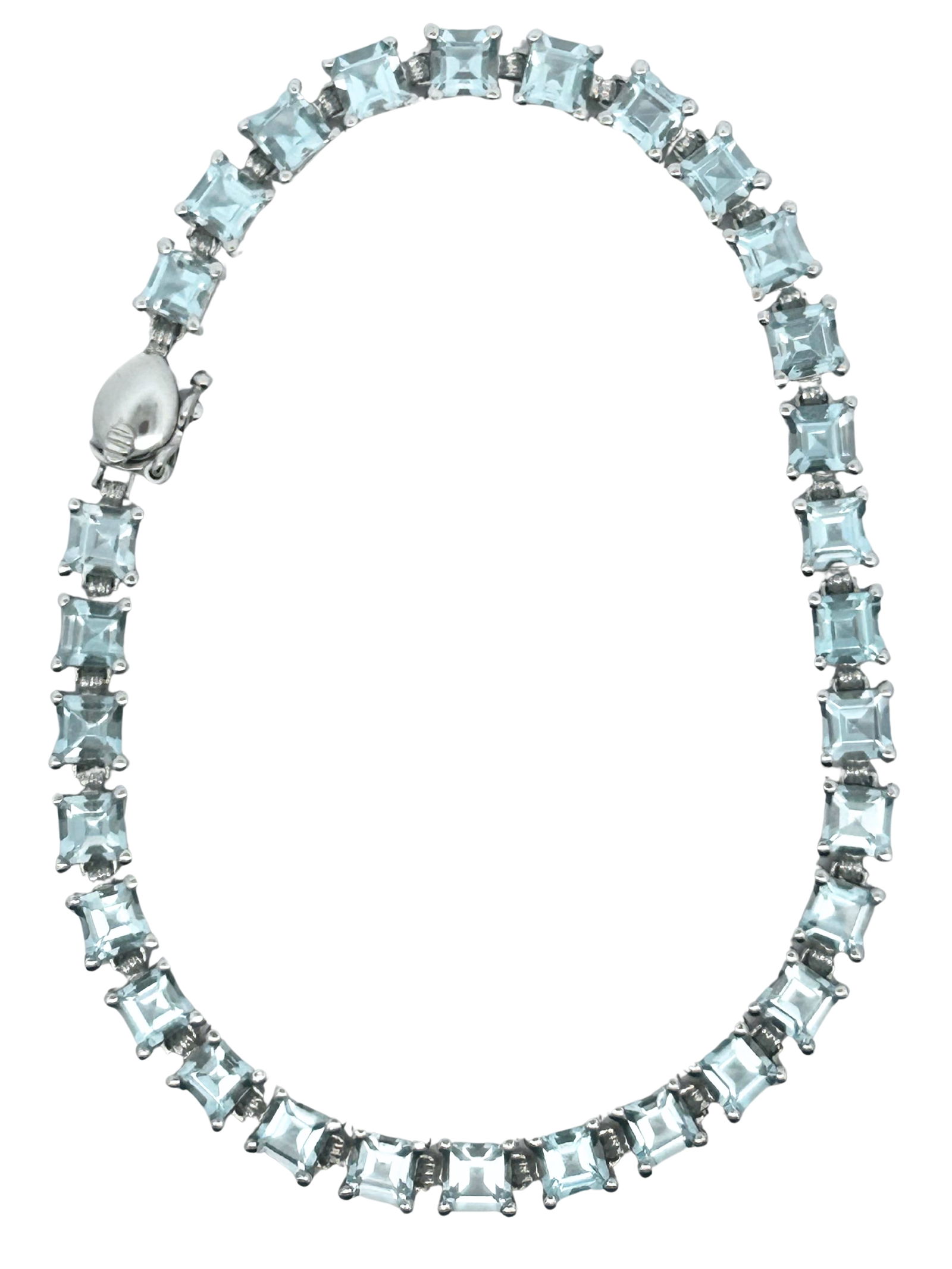 14K Aquamarine Tennis Bracelet: ISL2293/3-MMYS This striking line bracelet, crafted in 14-karat white gold, features a continuous array of dazzling asscher-cut aquamarine gemstones. Each aquamarine, showcasing a beautiful,