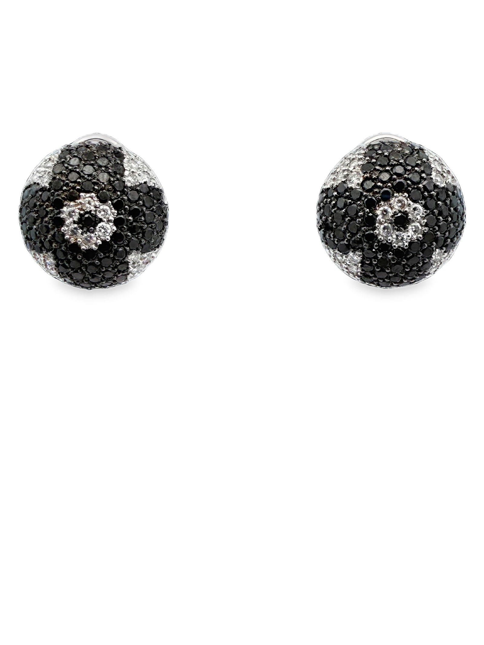 18K Black & White Diamond Earrings: ISL2293/34-MTYS This is a bold pair of 18K white gold stud earrings featuring a striking contrast of black and white diamonds. The earrings are domed, creating a three-dimensional, ball-like profile.