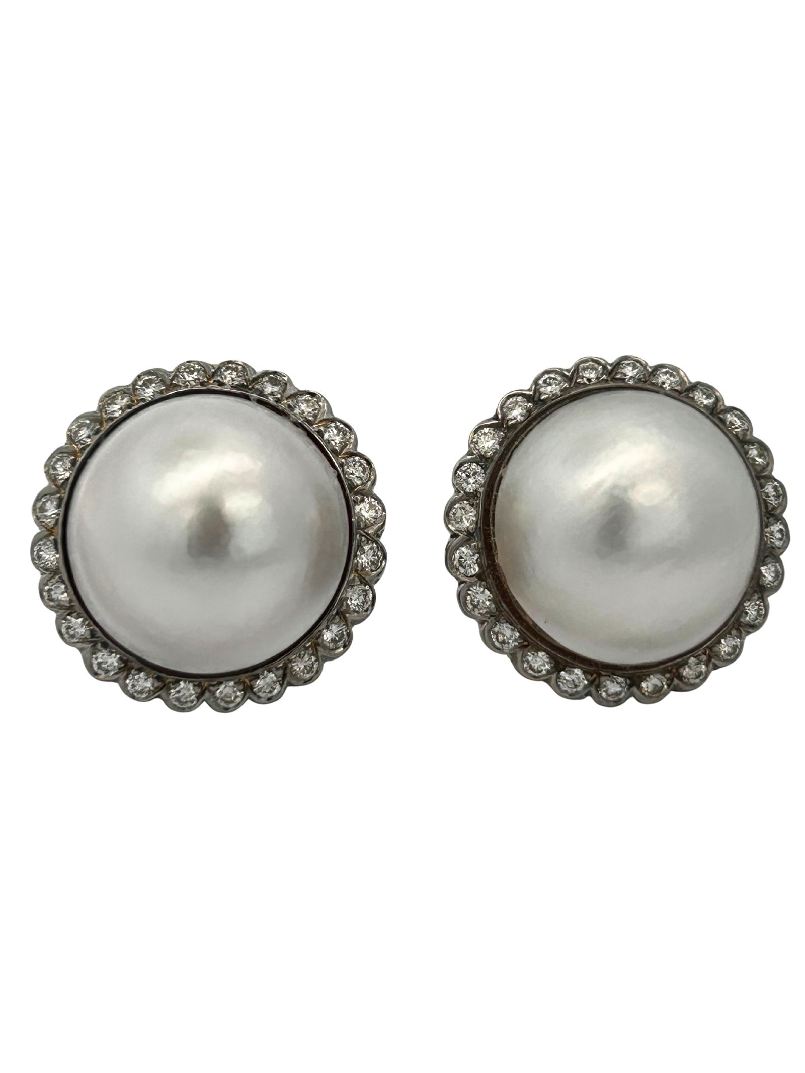 14K Mabe Pearl & Diamond Earrings: S/18.47- MYSS These striking earrings are a study in classic elegance, crafted from two-tone 14K gold. Each earring features a lustrous, domed mabe pearl as its centerpiece, a gem celebrated for its