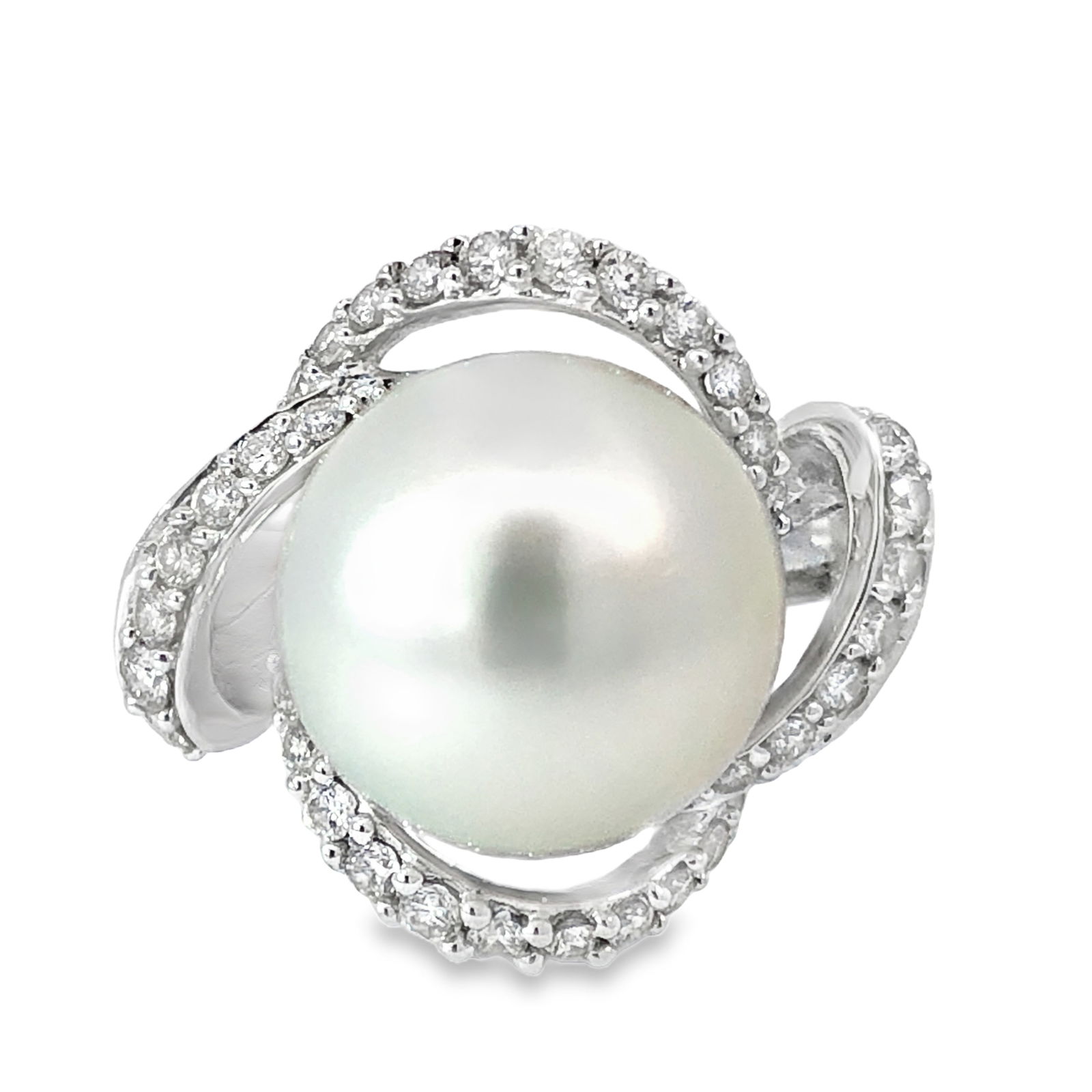Pearl and Diamond Ring: IS2172/28-KYS This stunning ring showcases a luminous 12mm South Sea pearl embraced by swirling ribbons of sparkling diamonds, all crafted in luxurious 18k white gold. The substantial si