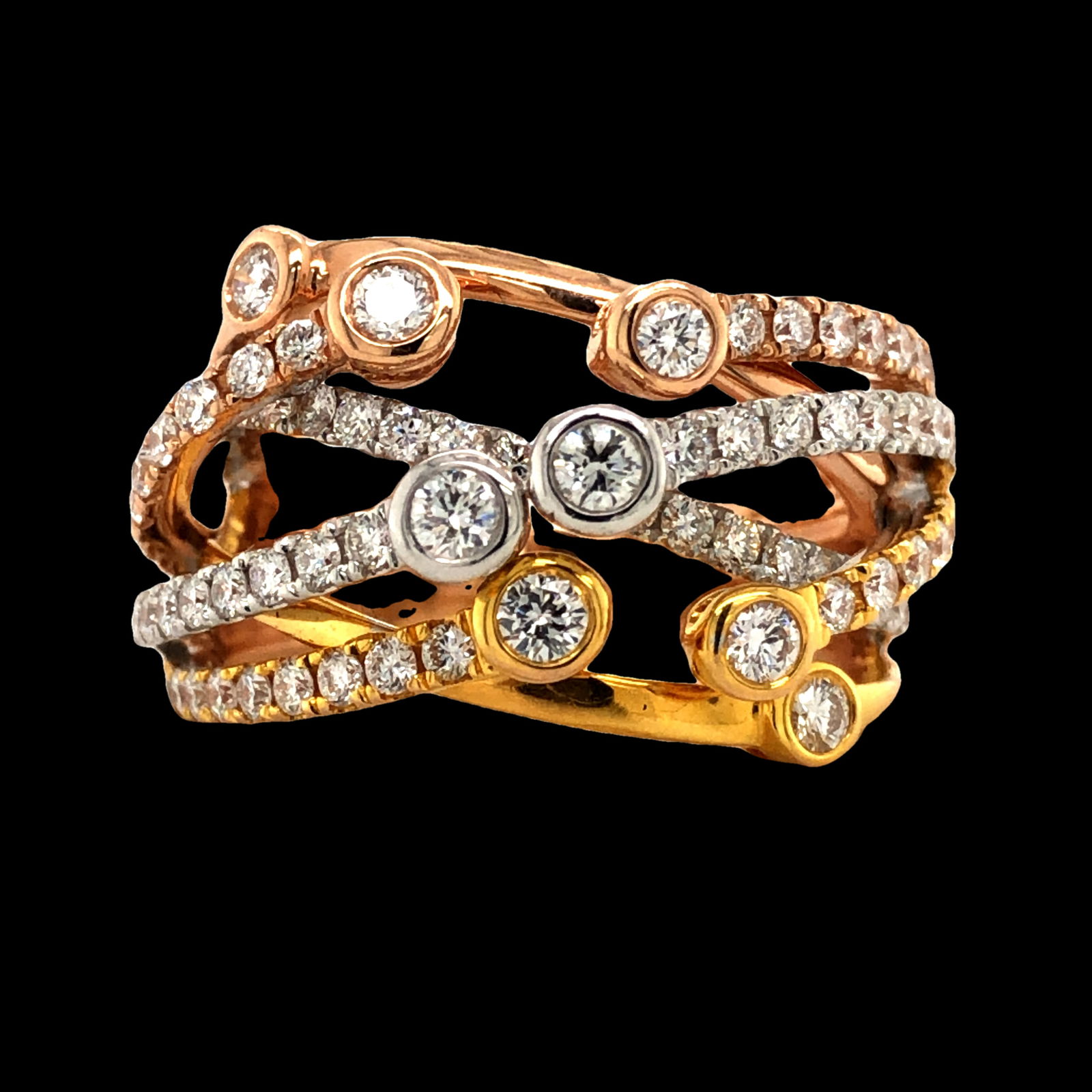 Tri Color Diamond Ring: S/8.1-NOYS An intricate and stunning statement piece, this tri-color diamond ring showcases a beautiful interplay of 14k yellow, white, and rose gold. The ring is a multi-band, crisscross design,
