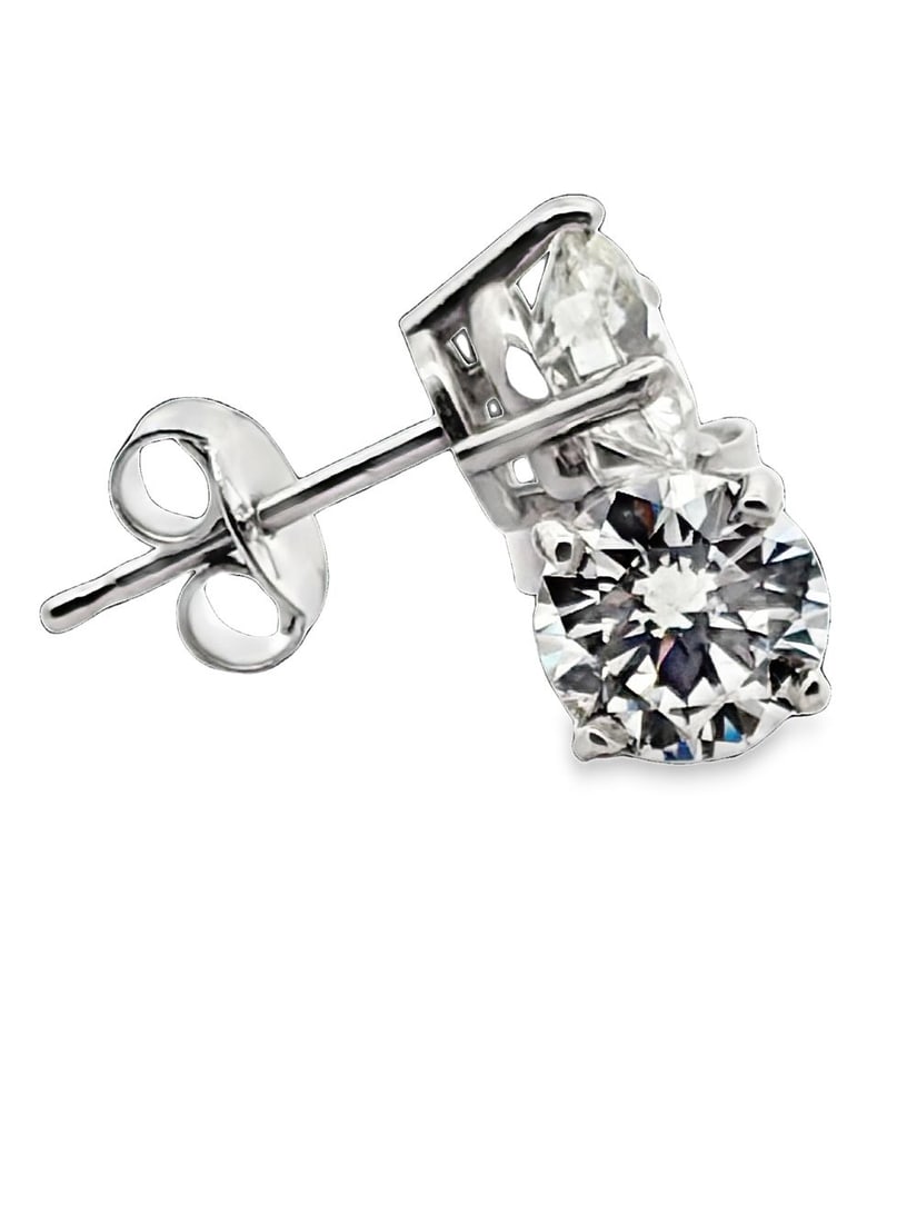 Diamond Stud Earrings: ISL2293/48-MESS A quintessential staple for any fine jewelry collection, these timeless diamond solitaire stud earrings are elegantly mounted in solid 14K white gold settings. Each earring showcases