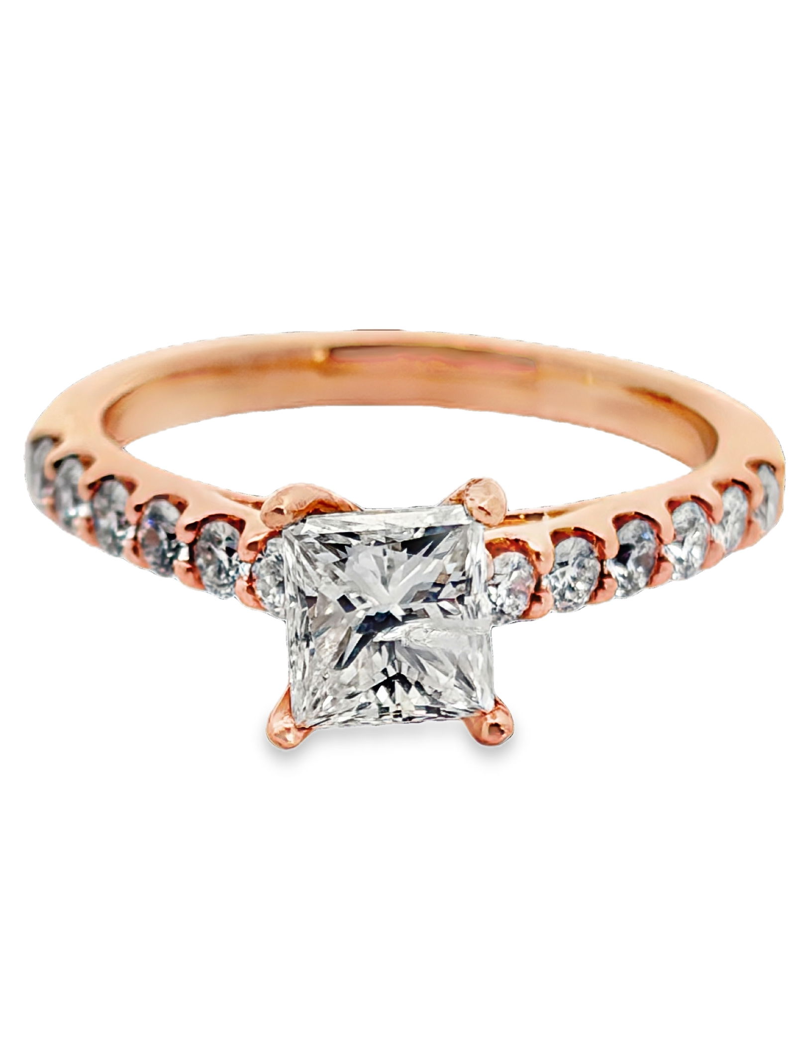 Rose Gold Diamond Engagement Ring: ISL2293/45-MMSS This exquisite princess-cut diamond engagement ring radiates modern elegance and timeless romance. The centerpiece features a dazzling square princess-cut diamond, expertly set in a c
