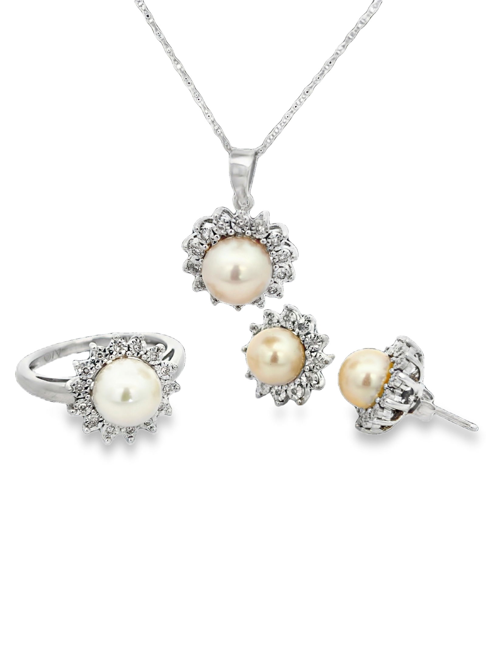 Pearl & Diamond Ring Necklace Earrings Set: S/10-ASS This graceful, matching jewelry set, crafted in radiant 10-karat white gold, features a classic design comprised of a ring, pendant necklace, and stud earrings. Each piece centers on a