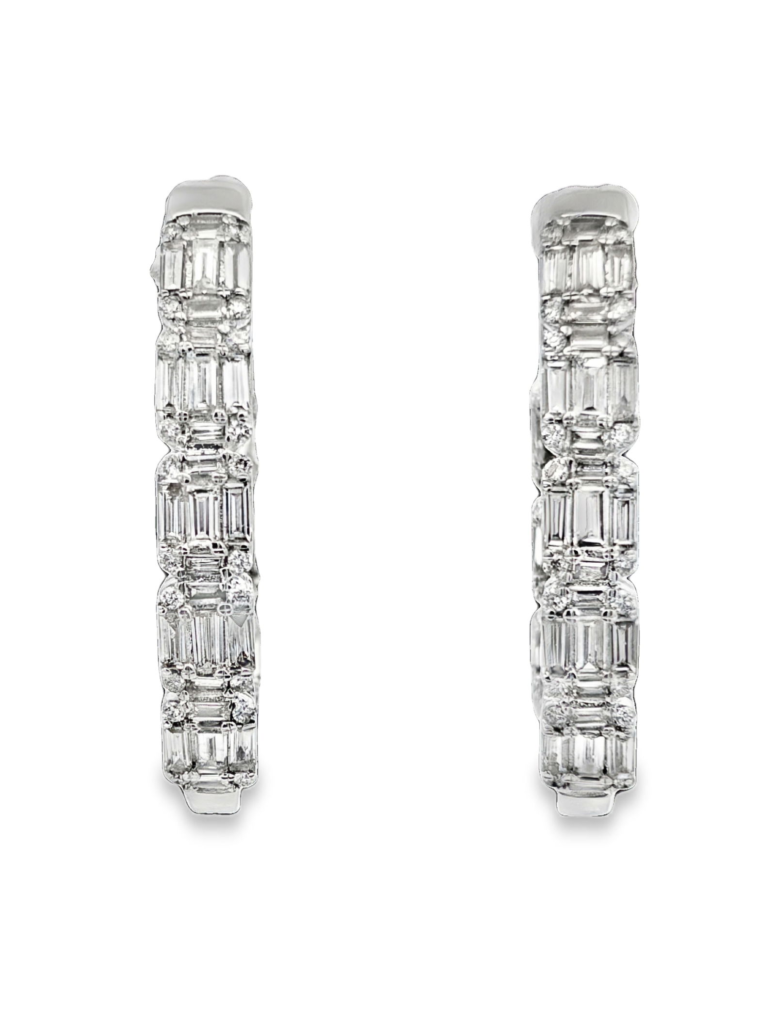 2.00 CTW Diamond Hoop Earrings: GS6259/24-MTYS A masterpiece of luxury and light, these 14K gold hoop earrings feature a commanding 2-carat total weight of round brilliant and shimmering baguette diamonds. The rhythmic