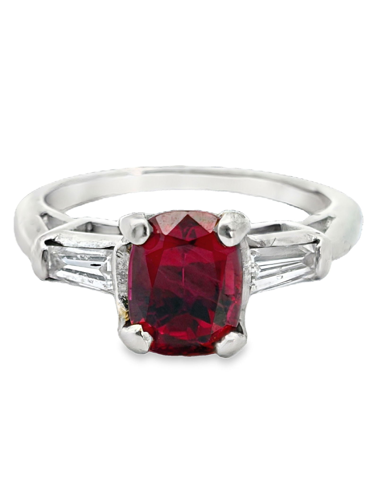 Ruby and Diamond Ring: ISL2293/27-MOYS Bid on this exquisite 14K white gold ring, which immediately captivates with a vibrant, cushion or square-cut natural ruby at its center, showcasing a deep, rich red