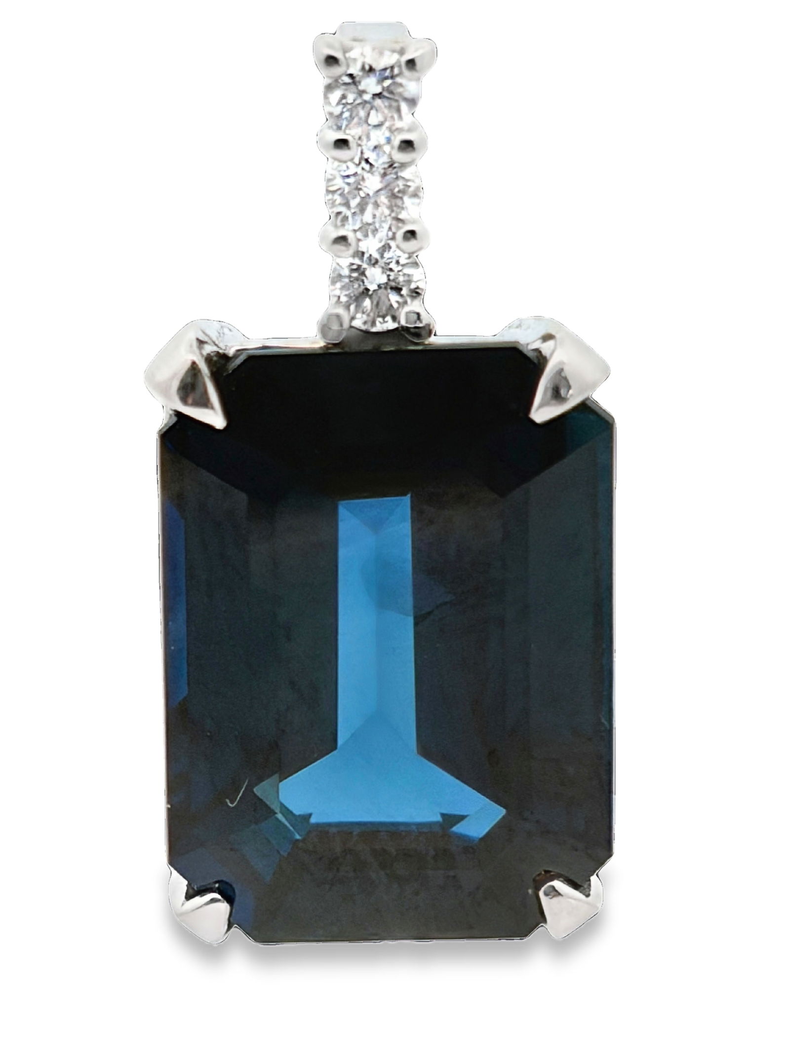 Platinum Blue Sapphire (No Heat) & Diamond Pendant: ISL2293/22-ELSS This is an elegant platinum pendant featuring a prominent, no heat deep blue sapphire accented by sparkling diamonds. The main stone is an emerald-cut blue sapphire, valued for