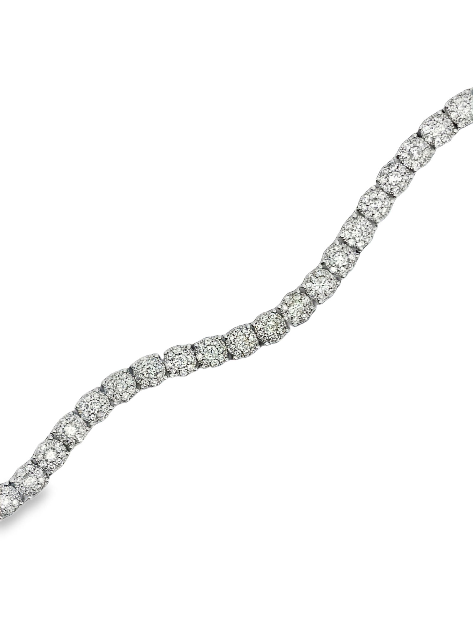 14K Illusion Set Diamond Bracelet: ISL2293/52-OEYS Capture endless sparkle with this exquisite 14K white gold diamond tennis bracelet, showcasing a seamless row of brilliant light created by the illusion-set diamonds. Each