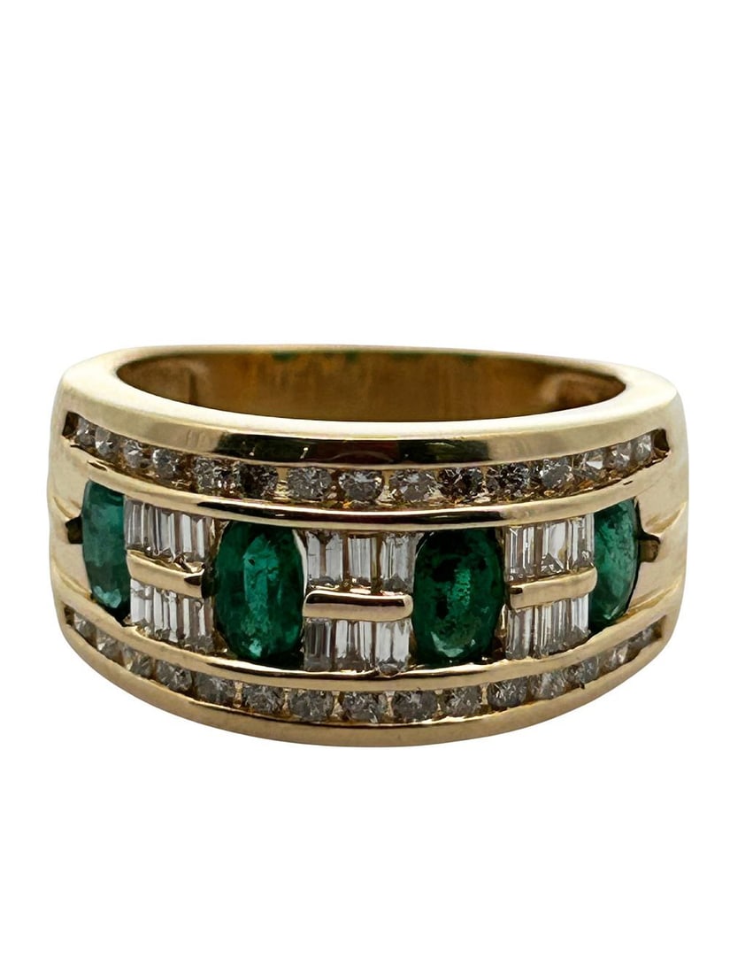 14K Diamond & Emerald Band Ring: S/4.21-KSS This impressive and wide band ring is crafted in rich 14-karat yellow gold and features a striking arrangement of emeralds and diamonds in a geometric,
