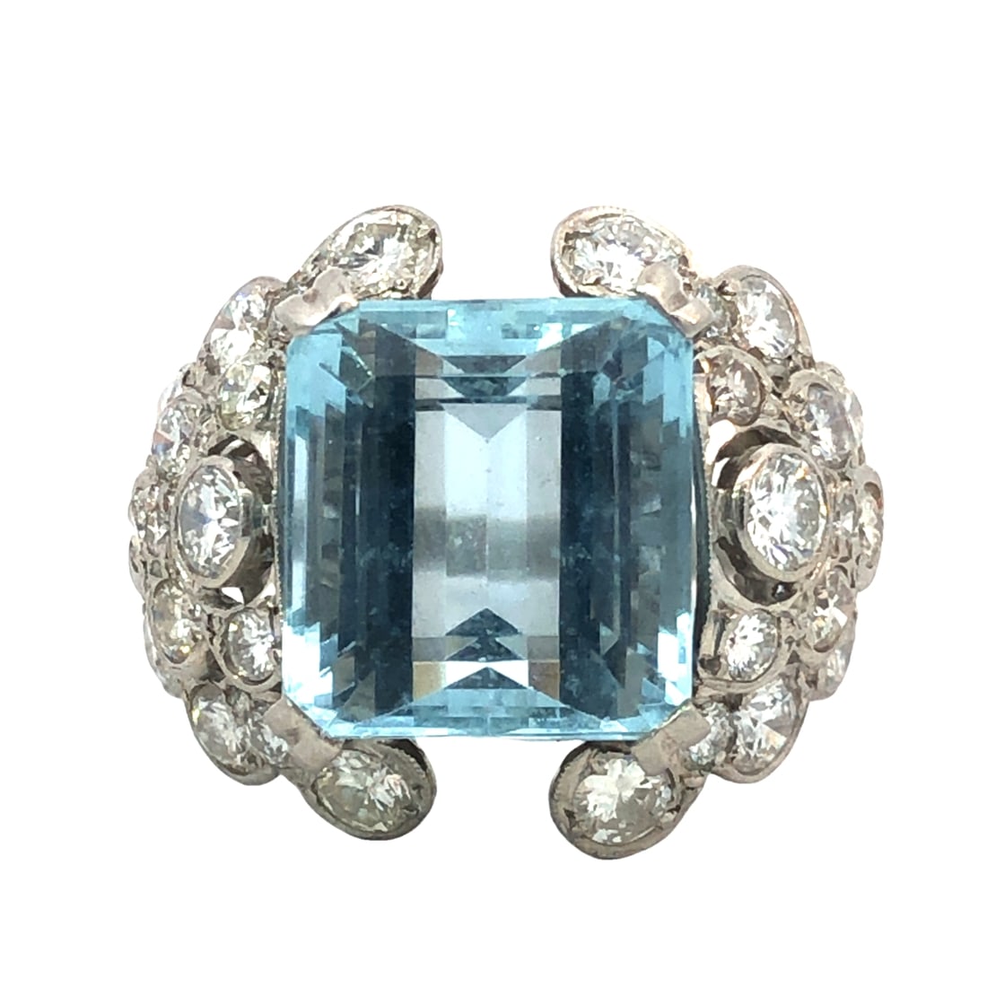 Art Deco Aquamarine & Diamond Ring: ISL2172/49-OMSS This impressive statement ring features a magnificent, sizable emerald-cut natural Aquamarine as its centerpiece, showcasing a clear, vibrant light-blue hue reminiscent of