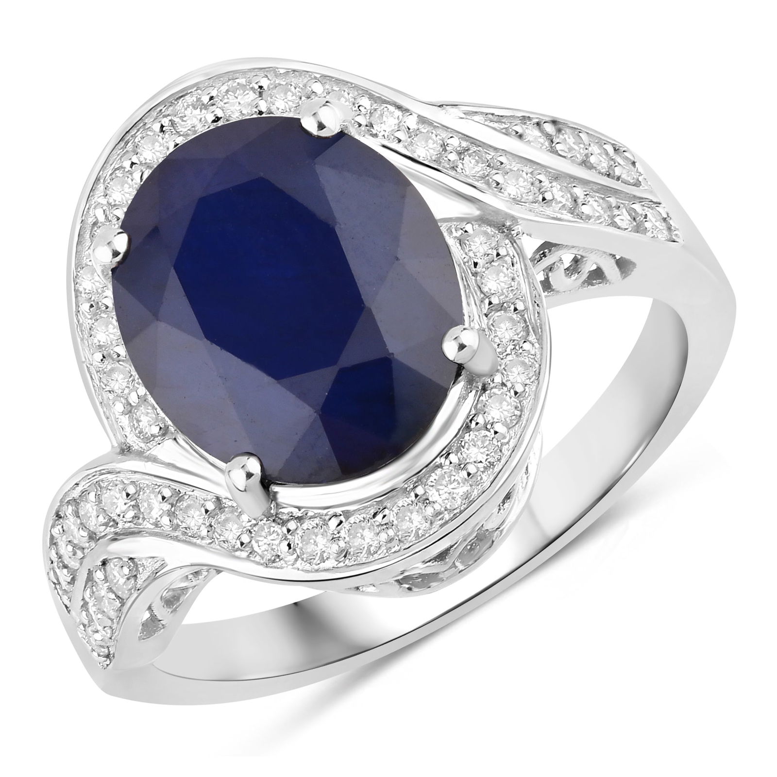 Blue Sapphire and Diamond Ring: QJ8423/2-MEAO This elegant ring showcases a deep blue oval-cut sapphire surrounded by a dazzling swirl halo of round brilliant diamonds, blending classic beauty with contemporary sophistication. 