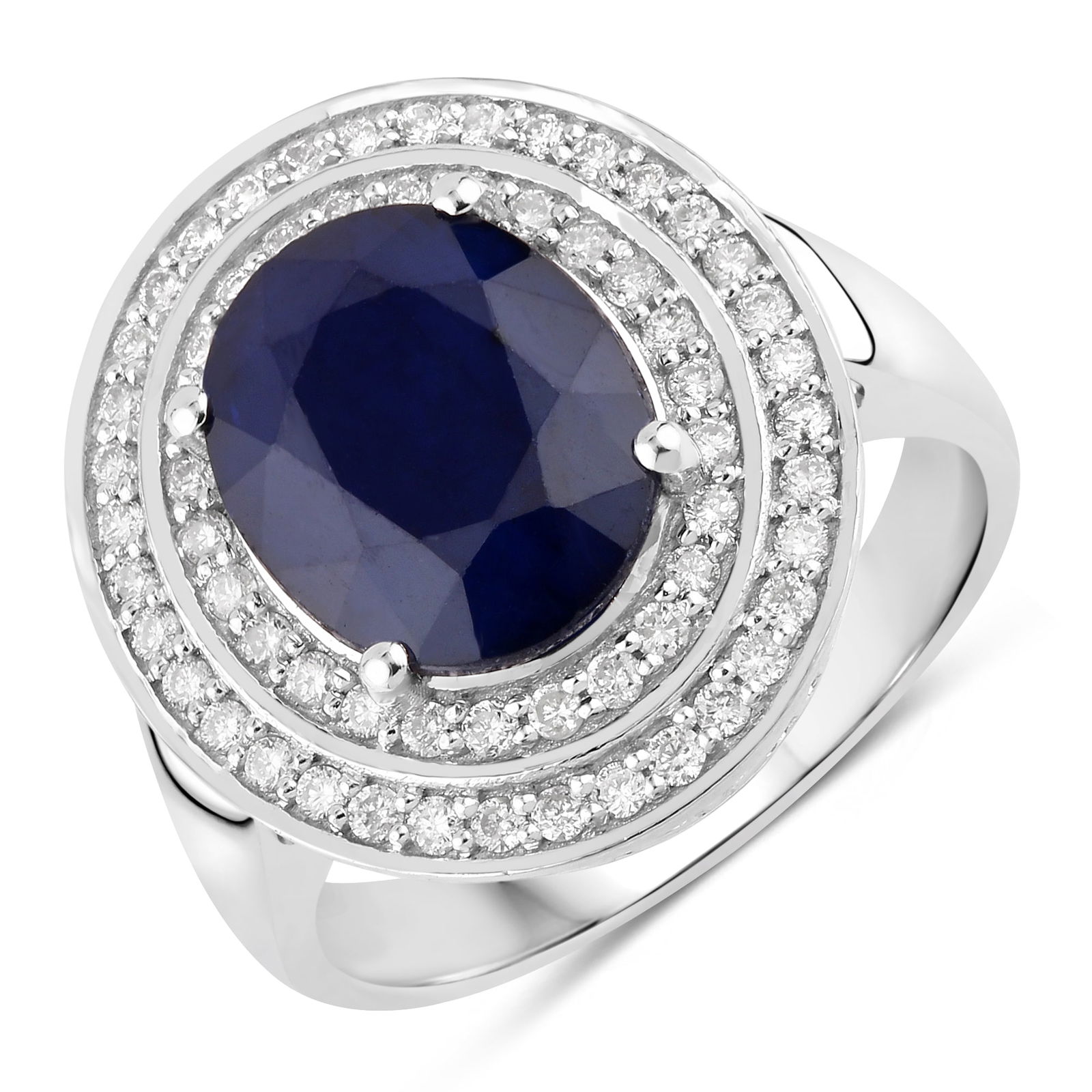 Blue Sapphire and Diamond Ring: QJ8423/12-MYKY A vision of refined sophistication, this exquisite ring highlights a striking oval-cut blue sapphire, elegantly framed by a double halo of brilliant white diamonds. The