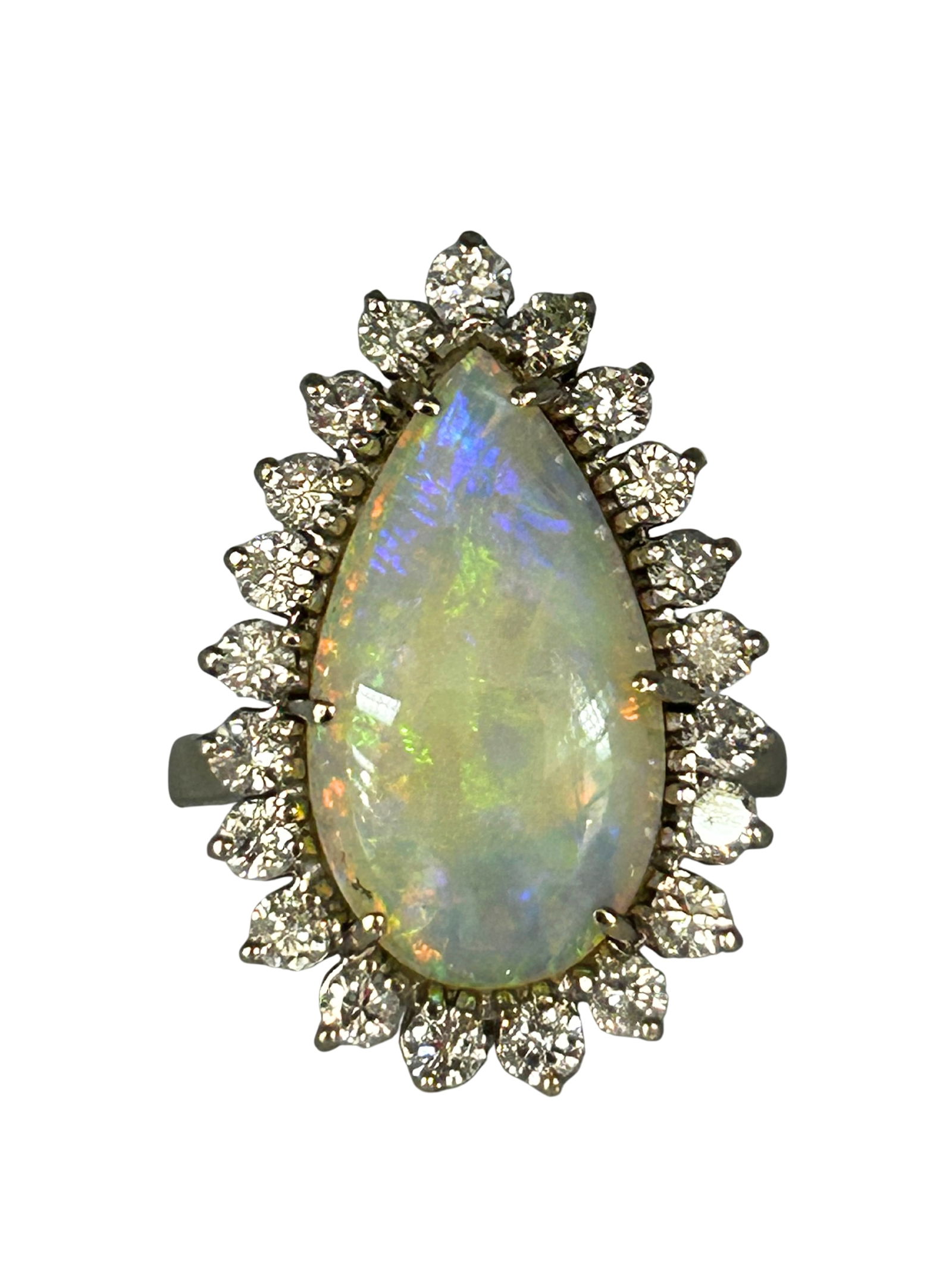 14K Opal & Diamond Ring: S/6.37-MNYS This breathtaking 14K white gold ring is a magnificent celebration of color and light. At its center, a large, pear-shaped opal captivates with an incredible play-of-color, flashing with