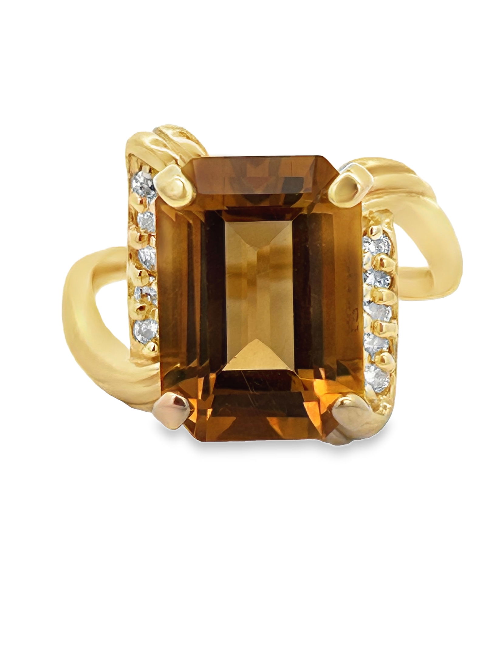 Citrine and Diamond Ring: S/7-LSS This elegant ring showcases a prominent, emerald-cut citrine, radiating a warm, captivating golden-amber hue. The impressive center stone is beautifully complemented by diamond accent along bo