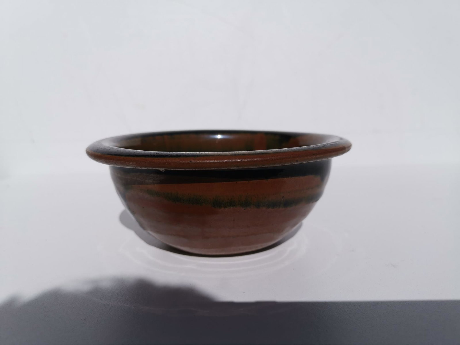 HENAN YAO HOU TAI BLACK GLAZE BROWN SPOT BOWL: HENAN YAO BLACK GLAZE BROWN SPOT BOWL. D 5 3/4 inches.