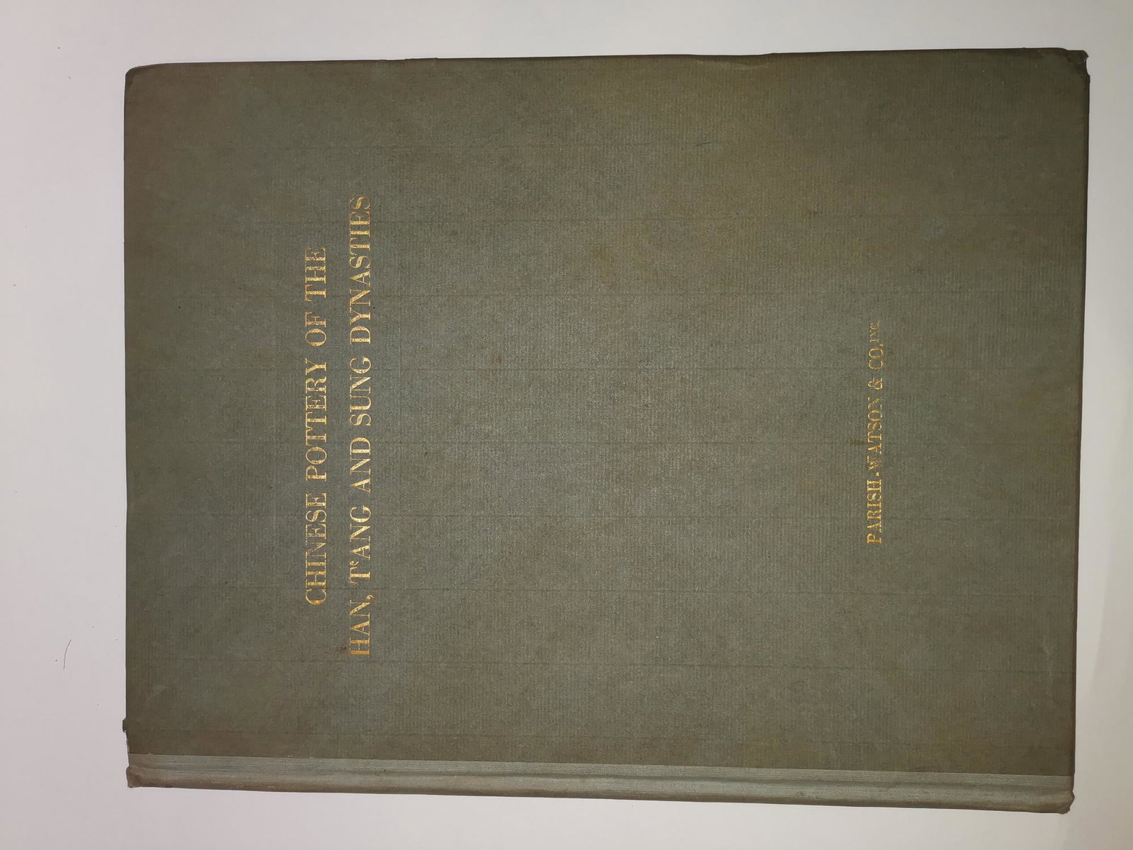 CHINESE POTTERY OF THE HAN, TANG AND SUNG DYNASTIES IN: CHINESE POTTERY OF THE HAN, TANG AND SUNG DYNASTIES, OWNED AND EXHIBITED BY PARISH-WATSON & CO., INC. PUBLISHED IN NEW YORK 1917. 10 X 13 INCHES.