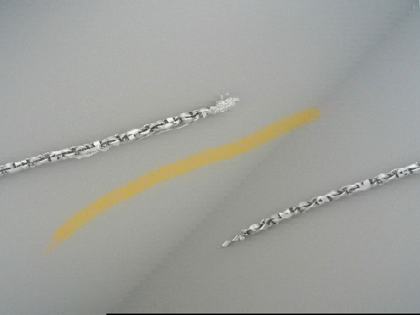 Diamond and Gold Chain bracelet: A 7 inch diamond and yellow gold chain bracelets Set with 66 round diamonds with a total carat weight 2.28, G color, VS clarity Approximate Retail Value $8,000.00