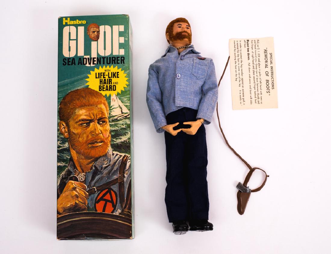 1970 G.I. Joe Sea Adventurer: DESCRIPTION: 1970 G.I. Joe Sea Adventurer item # 7402 in original coffin box. CONDITION: Bottom of box is a replacement. Stress cracks to both knees.