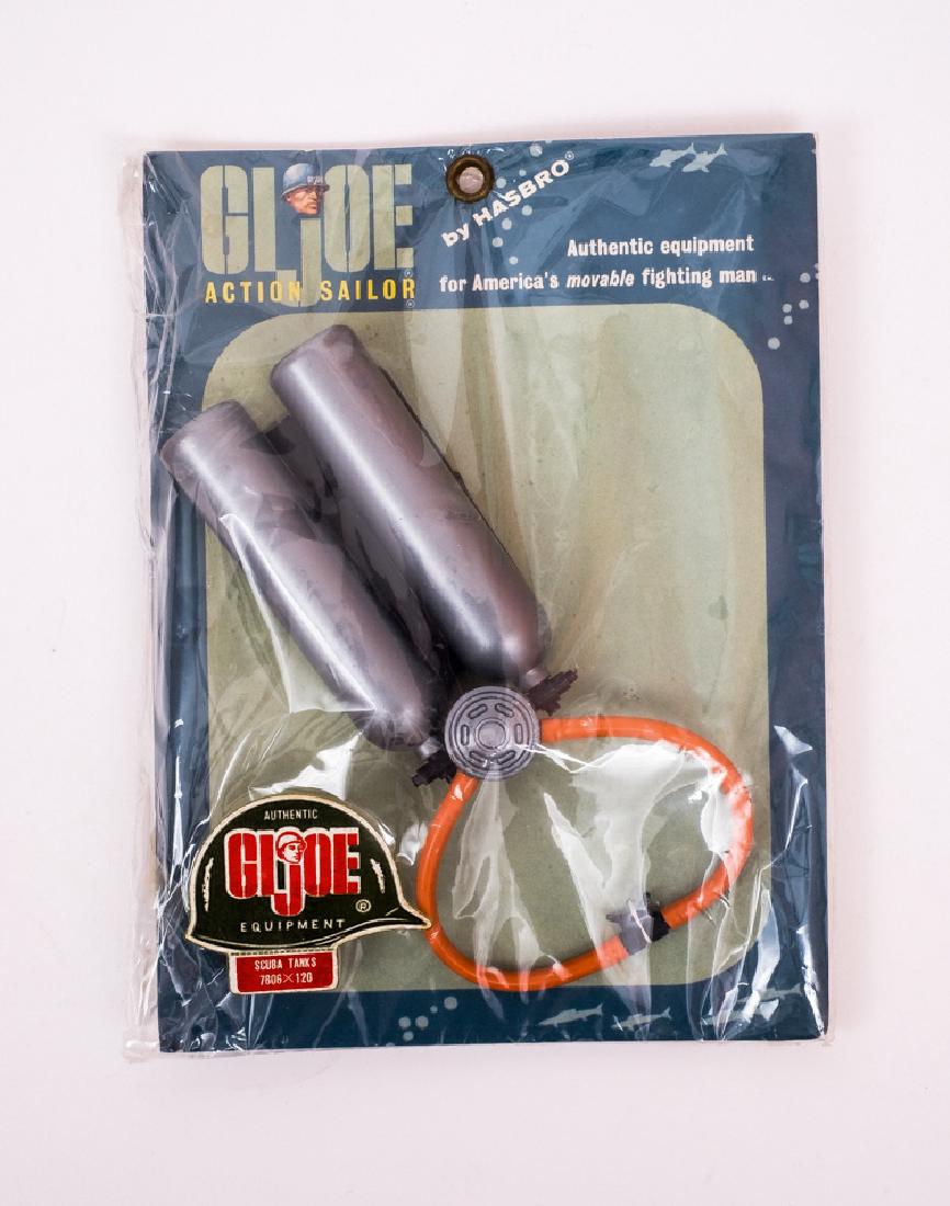 1964 G.I. Joe Action Sailor Scuba Tanks Set MOC: DESCRIPTION: 1964 G.I. Joe Action Sailor Scuba Tanks set item # 7606. CONDITION: Mint on card.