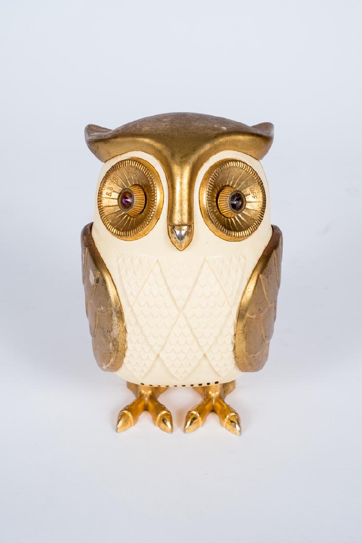 Midnight Owl Transistor Radio: DESCRIPTION: 1960s Midnight owl transistor radio. Made in Japan. MEASUREMENTS: 7" high. CONDITION: Discoloration to plastic to back. Light overall wear as expected with age and use.
