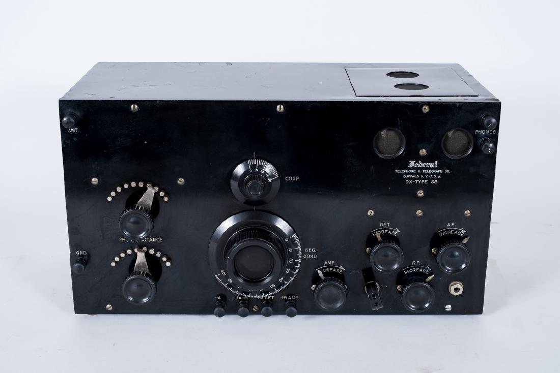Federal Telephone & Telegraph DX Type 58 Receiver: DESCRIPTION: Federal Telephone and Telegraph Company DX Type 58 receiver. Four tube. MEASUREMENTS: 17-1/2" wide x 8-1/2" deep x 9-3/4" high. CONDITION: Light overall wear as expected with age and use.