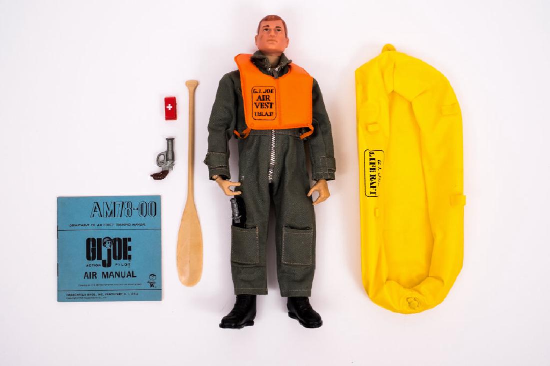 1960s G.I. Joe Figure in Air Force Survival Set: DESCRIPTION: 1960s G.I. Joe figure wearing 1964 Air Force Survival set # 7801. CONDITION: See photos for included accessories. Knees not examined. Wear to hair.