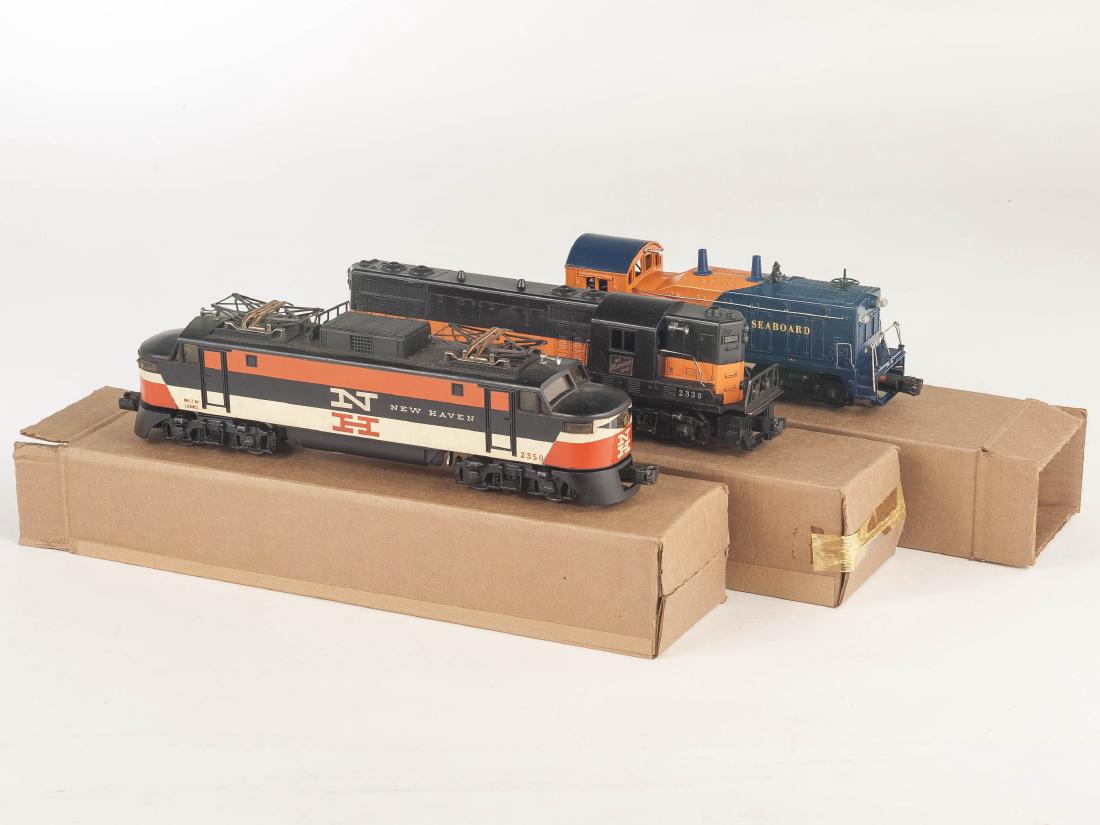 3 Lionel Locomotives incl. 2350: DESCRIPTION: Three Lionel locomotives. Includes 6250 2338, and 2350. CONDITION: Light wear as expected with age and use.