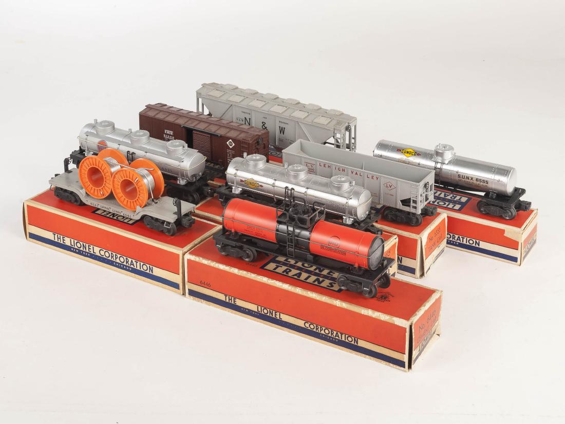 8 Lionel Freight Cars in OBs: DESCRIPTION: Eight Lionel freight cars. Includes 6454, 6456, 6415, 6446, 6315, 6461, 6555, and 6425. CONDITION: Light wear as expected with age and use. Wear, losses, and toning to original boxes.