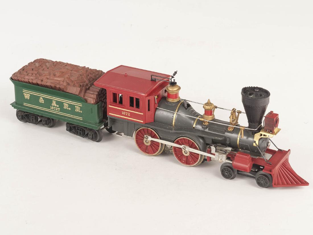 Lionel 1872 The General Loco with Tender: DESCRIPTION: Lionel 1872 The General locomotive with 1872T tender. CONDITION: Both with wear to wheels and trucks. Safety valve on locomotive is loose. Light wear as expected with age and use.