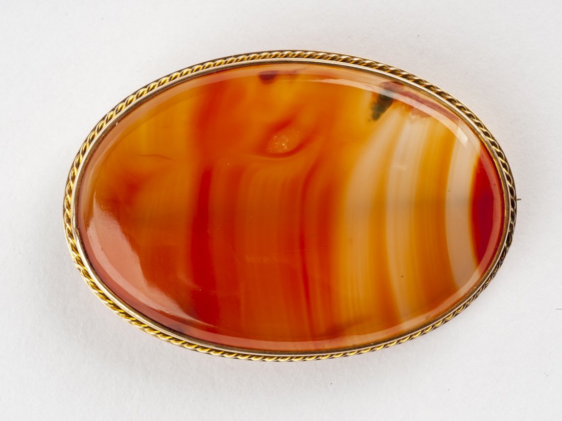 Antique 14K Carnelian Pin: DESCRIPTION: Tested 14k frame engraved verso with initials and dates 1854-1966. Set with carnelian stone. MEASUREMENTS: 2-1/4" x 1-1/2". CONDITION: Light wear as expected. Small blemish to surface of 