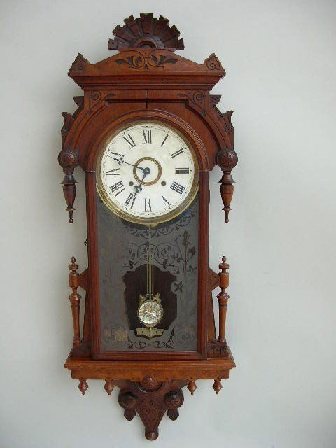 Kroeber #33 Eight Day Regulator Clock: Kroeber #33 Regulator Clock. "Kroeber New York" on pendulum level guide. 46" with a 9" dial. Mirrored pendulum. Walnut case split at top. Label verso "Eight Day Regulator Kroeber #33 New York". Workin
