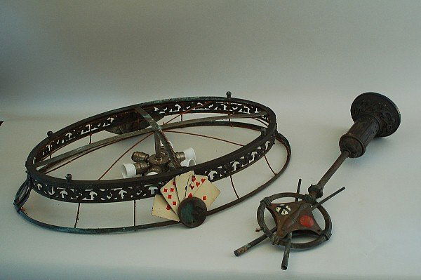 Billiard Table Bronze Light Fixture Handpainted: Bronze light fixture with handpainted playing cards, moon face medallion and bowling pins. Used above pool table. Circa 1920 to 1930. 20" x 34" oval x 5". Missing silk lining. Nice overall green patin