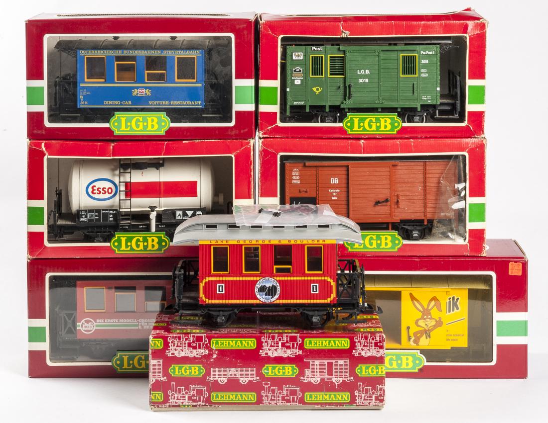 8 LGB Cars Most in OBs: DESCRIPTION: Eight LGB cars, most in original boxes. Includes: 3013 OBB dining car, 3019 post car, 3907 passenger, 4021 gondola with added track cleaner, 4040e Esso tank car, 4035 boxcar, 4528o Nesqui