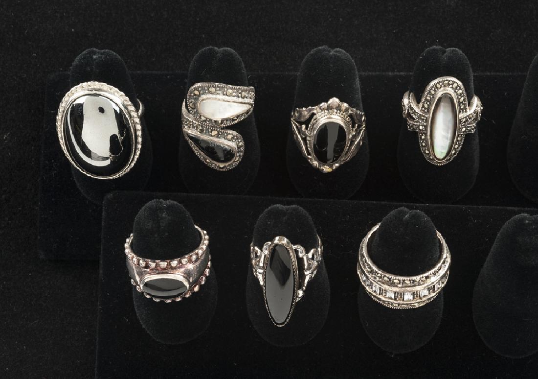 7 Sterling Rings incl Onyx & Marcasite: and Thai. Sizes 5 to 8.